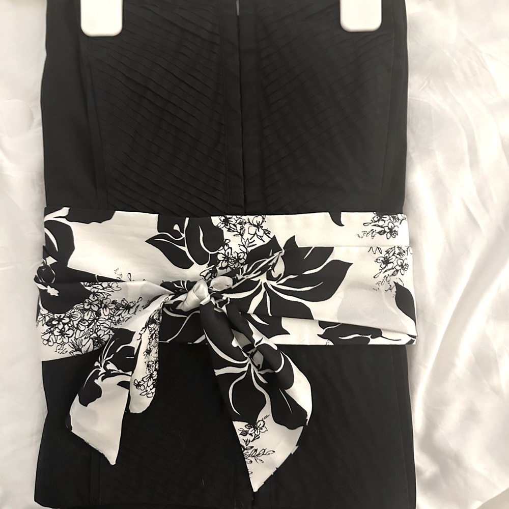 Navy and white busier with floral belt